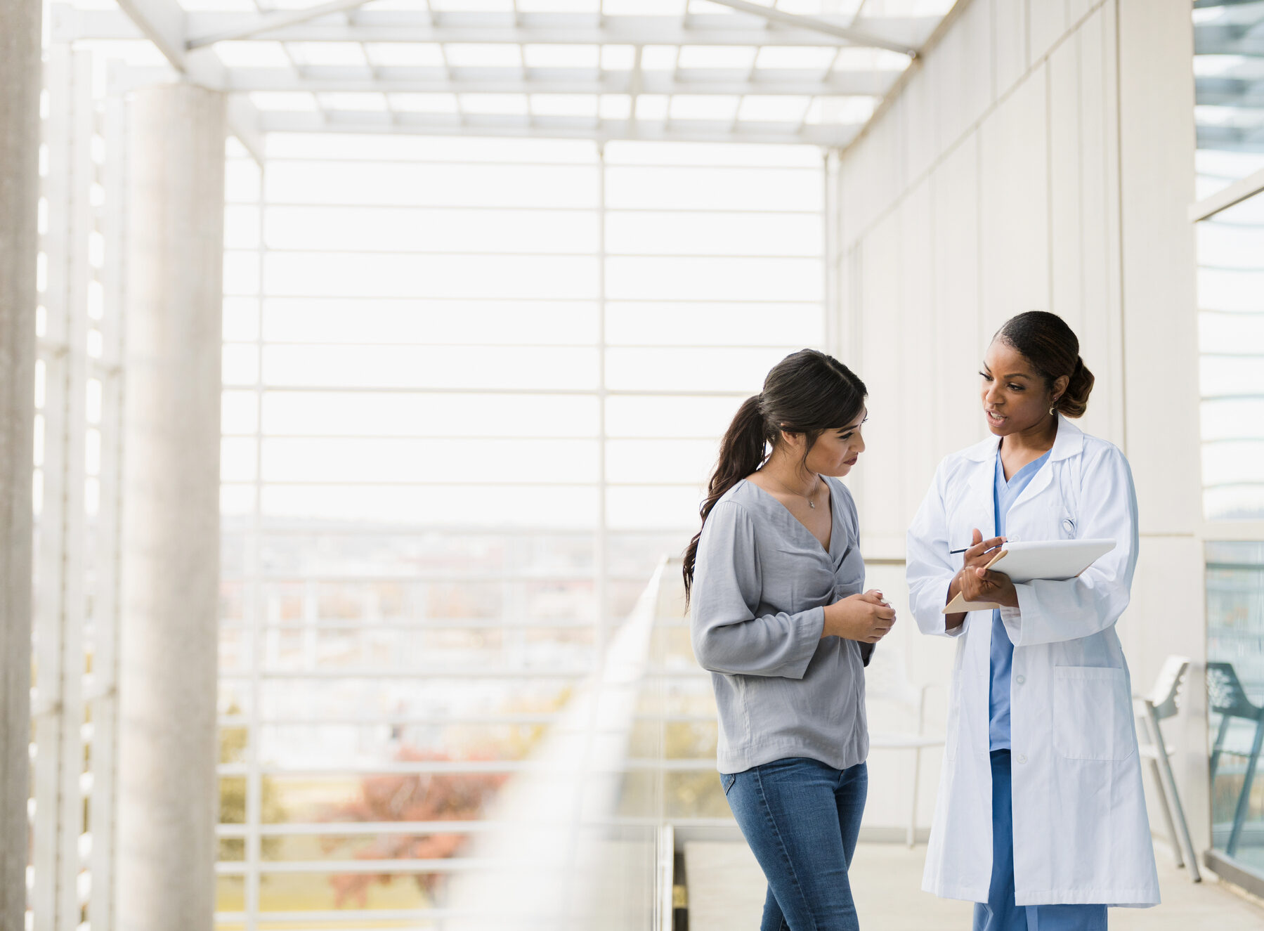 doctor discussing about cancer plan with her patient