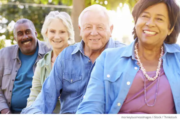 Outdoor group portrait of senior friends